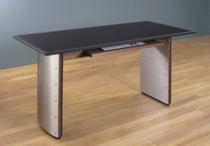 Modern Computer Desk in Walnut with Stainless Steel legs and a Honed Black Granite top for sale.