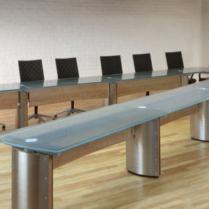 Crescent V Shaped Conference and Training table with a Modern Glass top and integrated wiring