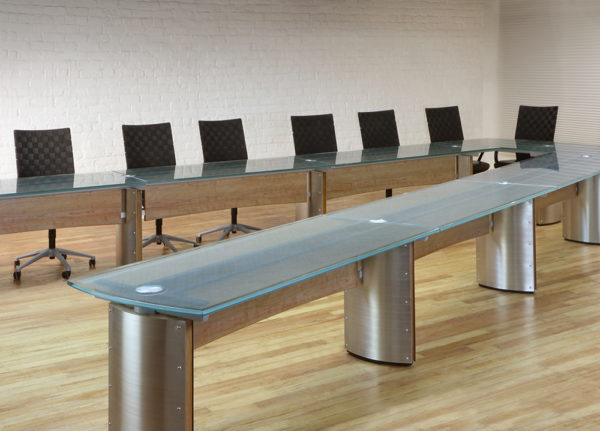 Crescent V Shaped Conference and Training table with a Modern Glass top and integrated wiring