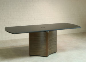 Custom Office Furniture with honed Black Granite meeting tables on Walnut wood pedestals.