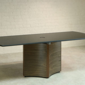 Custom Office Furniture with honed Black Granite meeting tables on Walnut wood pedestals.