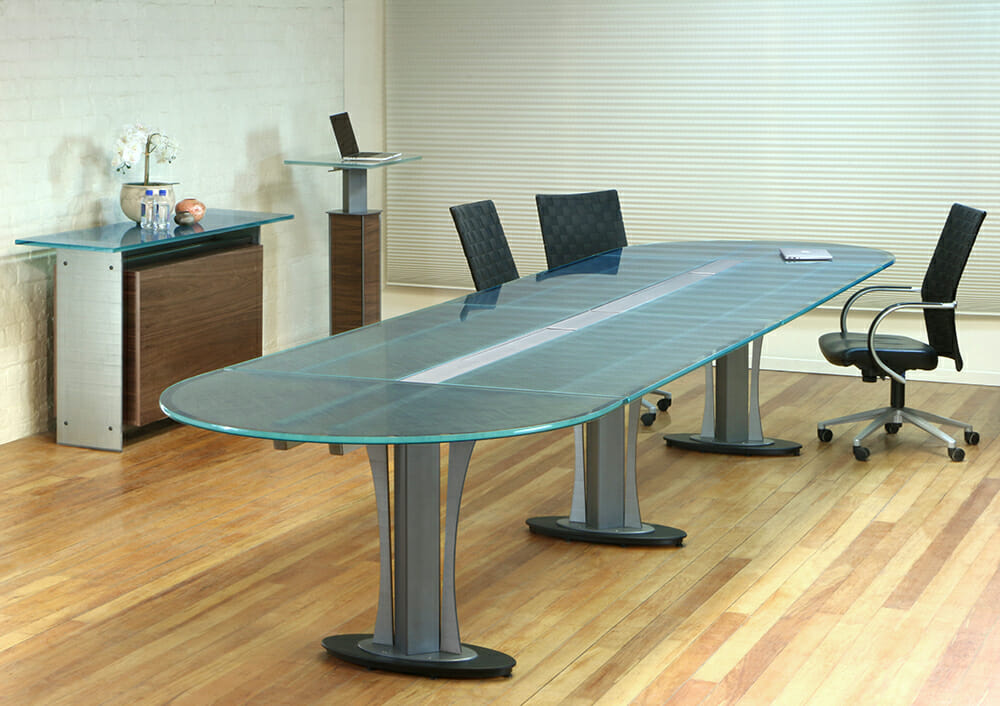 Tangent Racetrack shape custom conference table by Stoneline Designs. Glass tabletop on steel base.