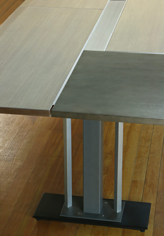 Custom Stand up boardroom tables with integrated wiring.