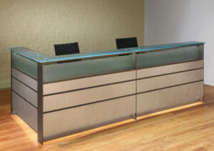 Tangent custom reception desk with lighting.