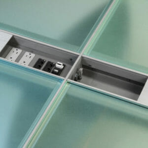 wiring-trough A Stoneline Designs wiring trough provides conference table power.
